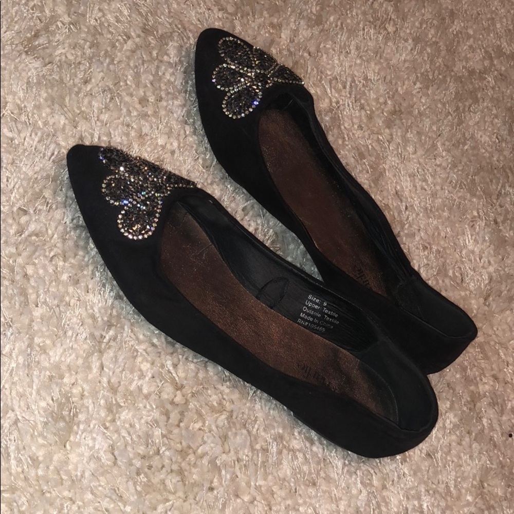 Black Flats with cute gemmed design. Elegant.